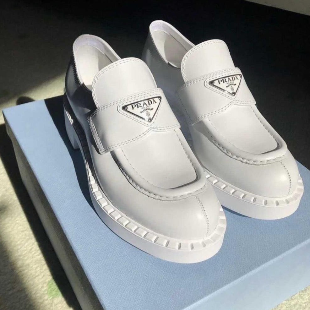 Prada white brushed leather loafers