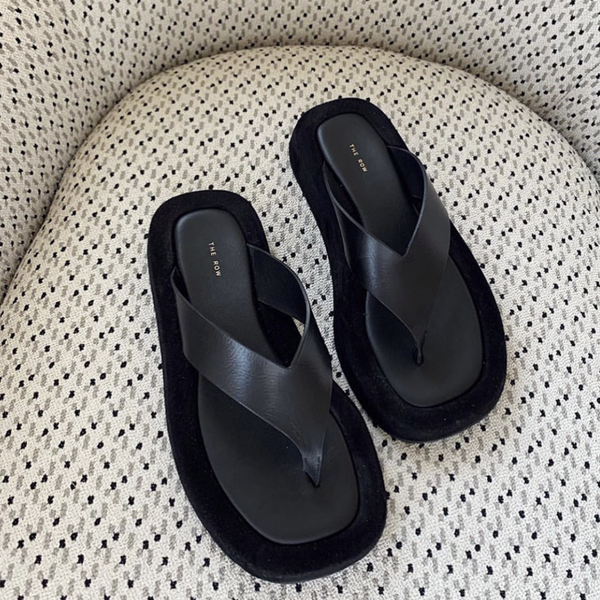 The Row black leather Ginza sandals