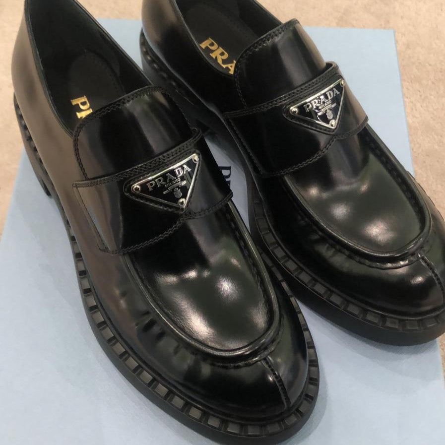 Prada black brushed leather loafers