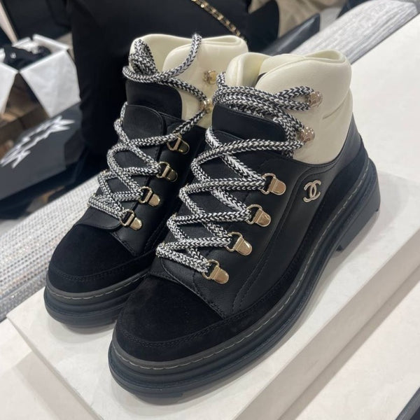 CHANEL Fall-Winter 22/23 black lace up boots